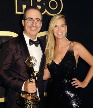 John Oliver with his wife.
